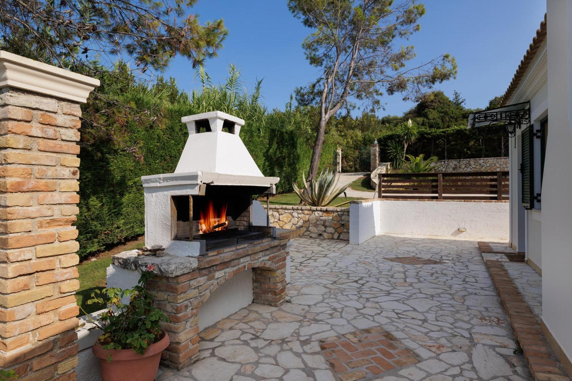Beachfront Dionysos - With Private Villa Sidárion