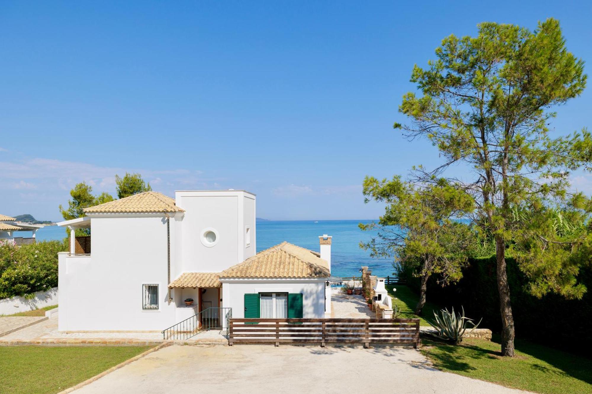 Beachfront Dionysos - With Private Villa Sidárion